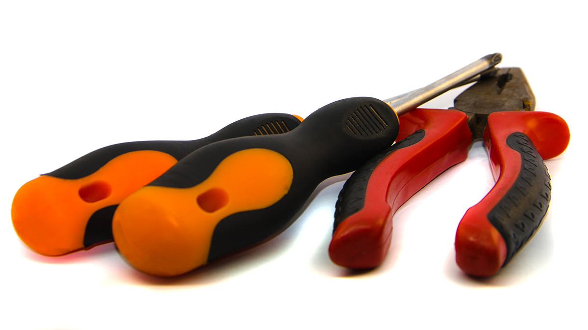 TPU overmolding pliers screwdrivers on white background shutterstock